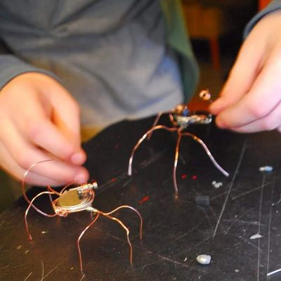 Vibrating bug bots made with motors and wires