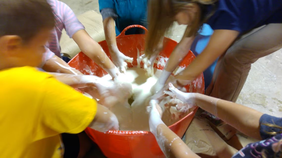 Kids hands in oobleck